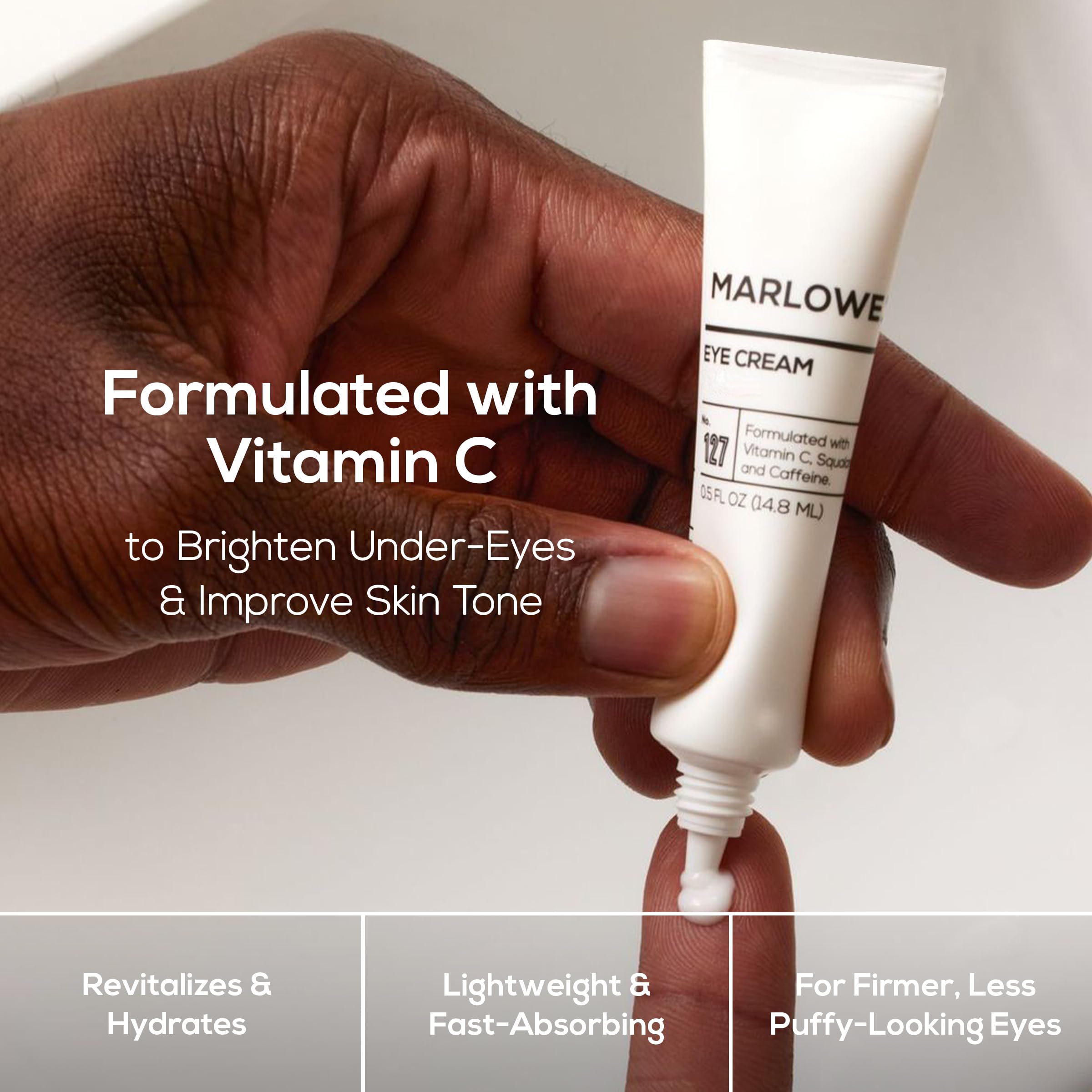 Applying MARLOWE No. 127 under-eye cream with gentle fingertips