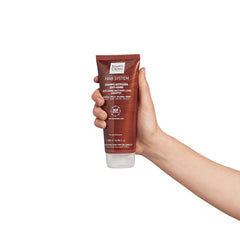 Martiderm anti hair-loss shampoo label detail highlights actives for nourishing cleansing.