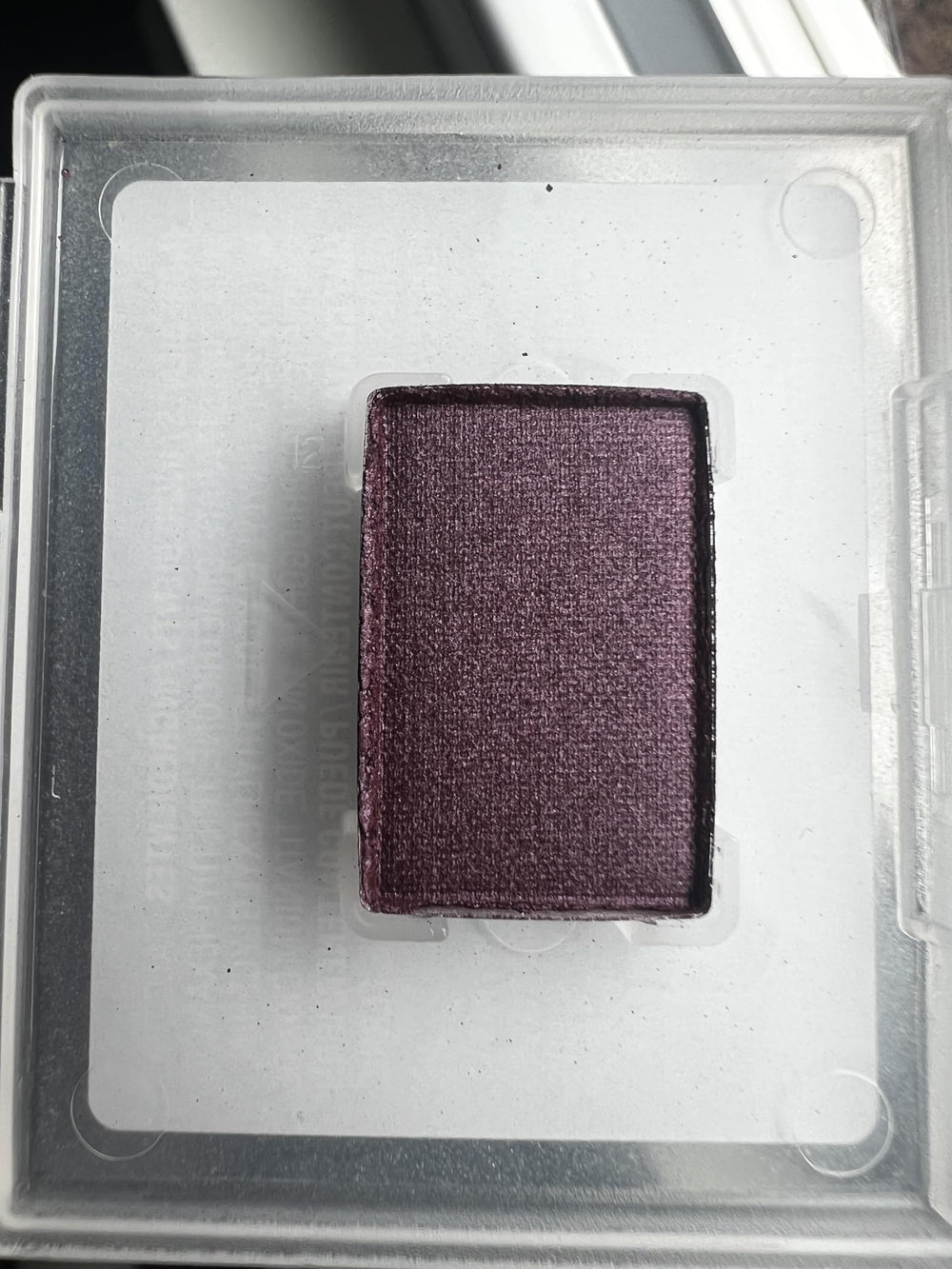 Mary Kay Mineral Eye Color Sweet Plum in compact open for on-the-go touch-ups.