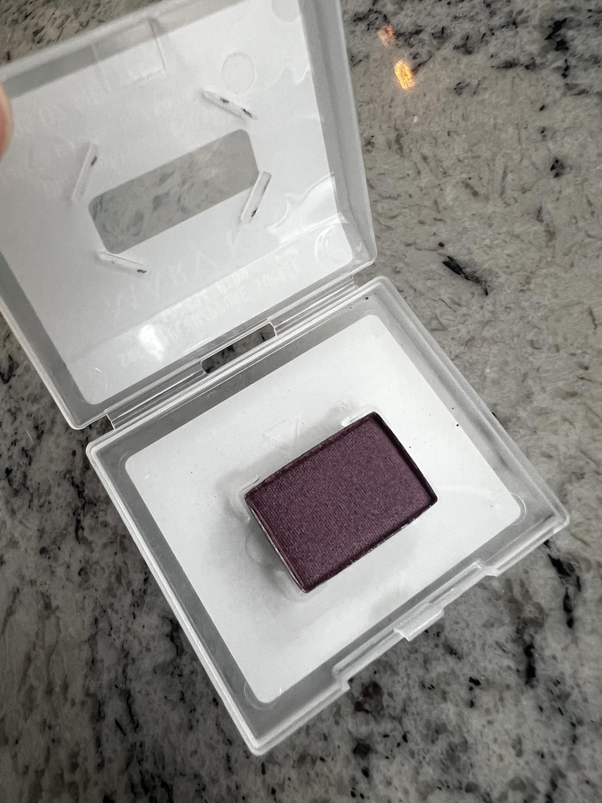 Mary Kay Mineral Eye Color Sweet Plum swatched to reveal crease-resistant, vibrant shade.