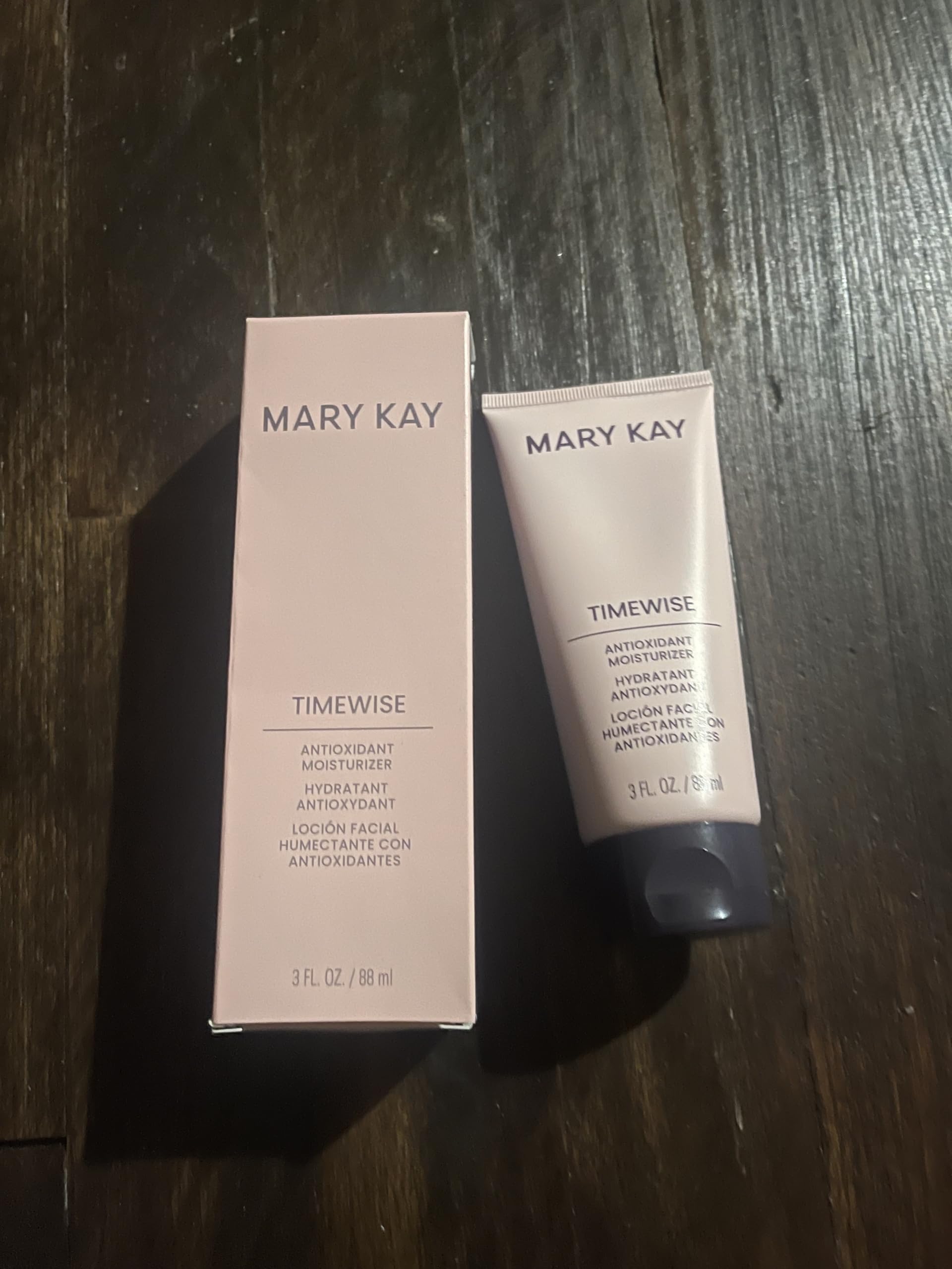 Mary Kay TimeWise Antioxidant Moisturizer bottle close-up highlights protective, smoothing formula.