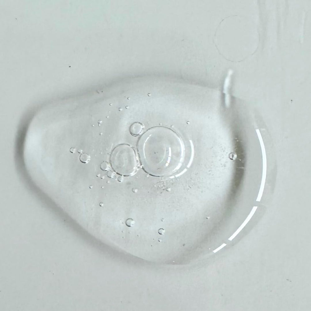 Masami Mekabu Hydrating Shine Serum dispensing pump close-up for easy use.