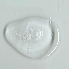 Masami Mekabu Hydrating Shine Serum dispensing pump close-up for easy use.