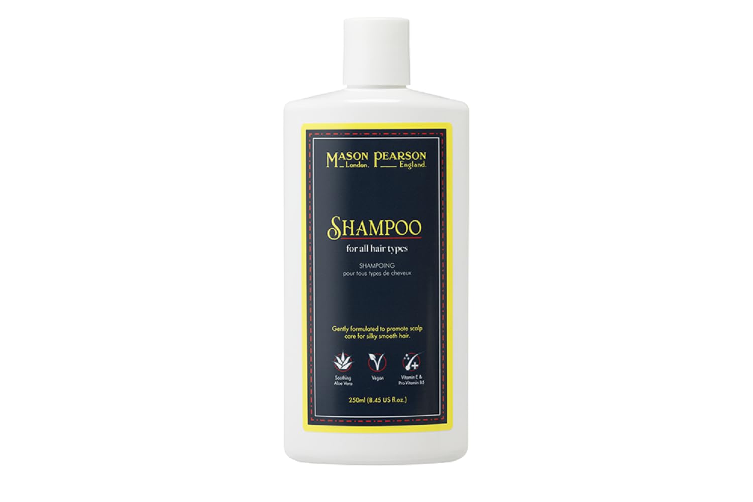 Mason Pearson Shampoo bottle being poured for all hair types, showcasing hydration and gentle cleansing.
