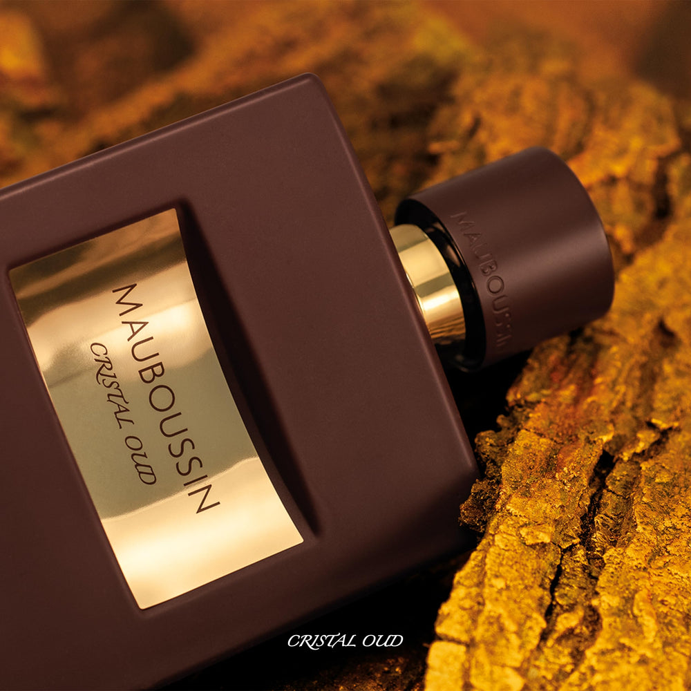 Mauboussin Pour Lui Crystal Oud bottle evokes jewelry heritage.