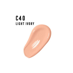 Facefinity foundation being spread to show smooth, seamless blending