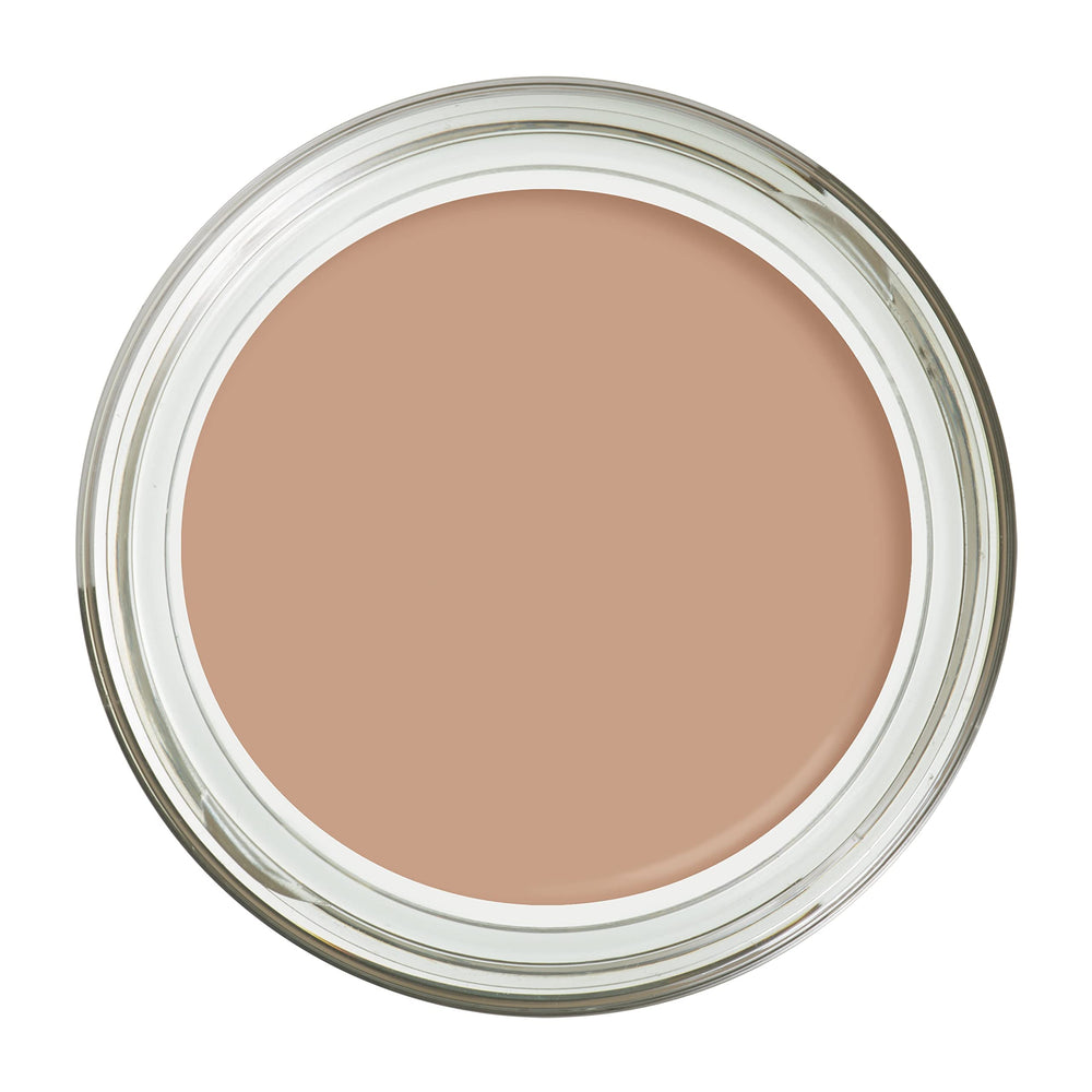 Swatch of Max Factor Miracle Touch foundation spreading smoothly on skin.