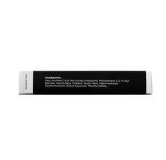 Close-up of MaxeyLash precision brush applying serum along lash line