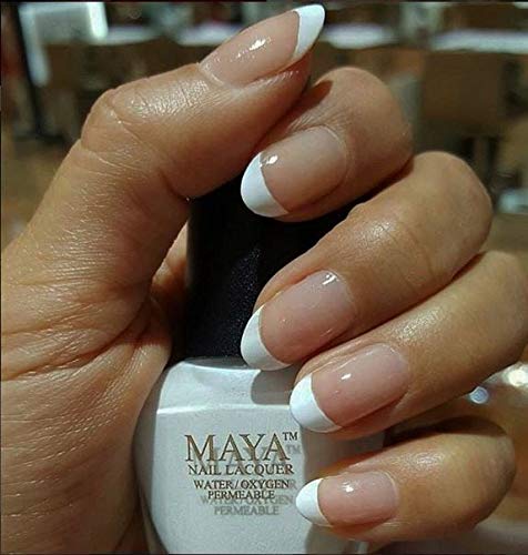 MAYA nail polish bottle with French manicure set ready for elegant nails.