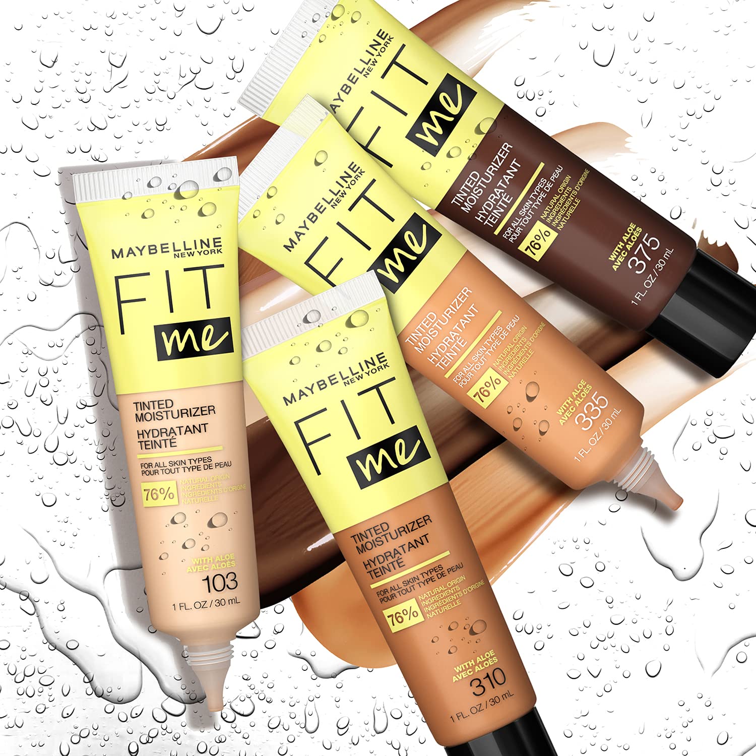 Packaging and 14-shade range of Maybelline Fit Me tinted moisturizer displayed.