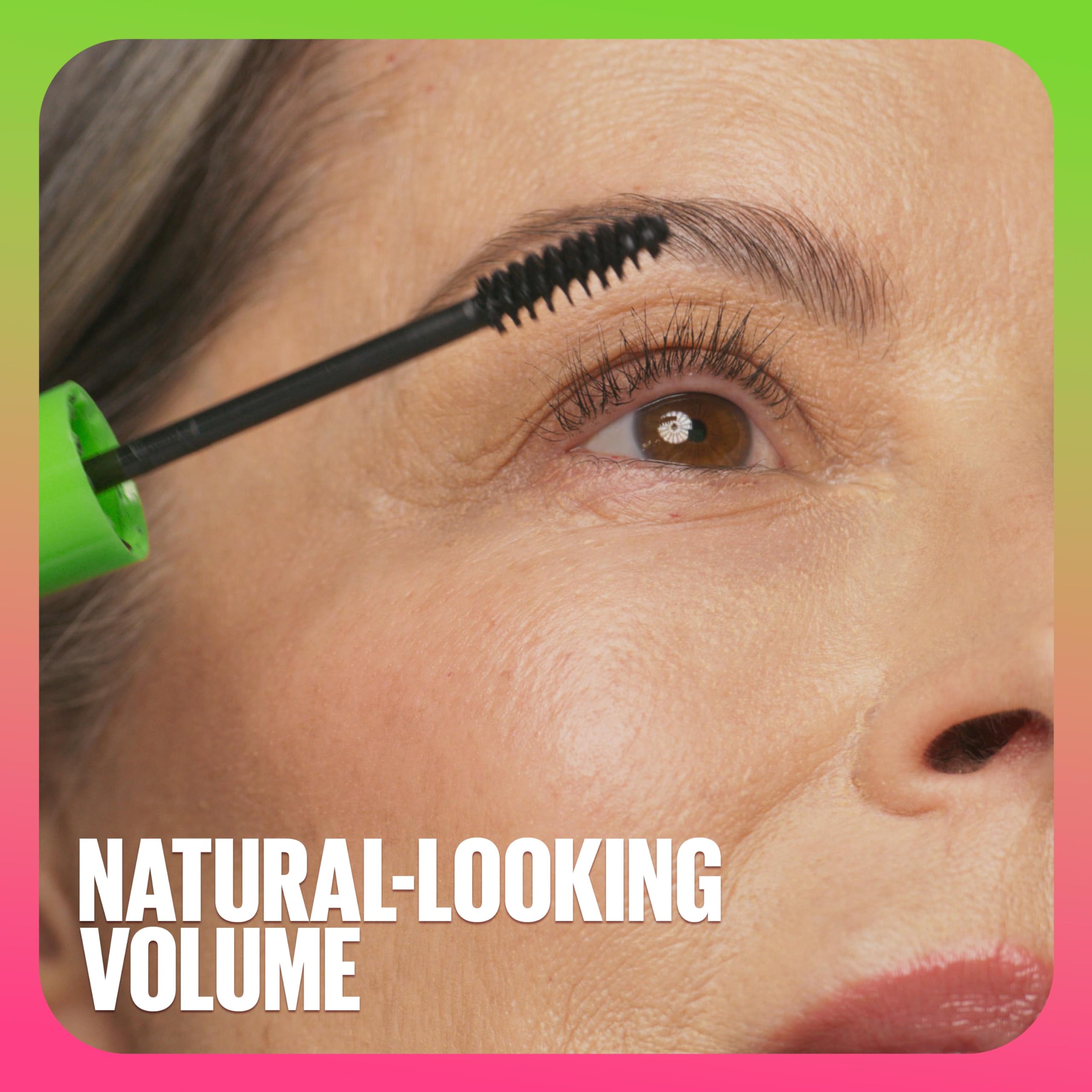 Maybelline Great Lash wand gliding smoothly to apply mascara evenly.