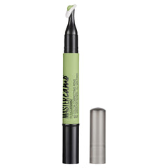 Maybelline Master Camo green swatch on cheek demonstrates redness neutralization.