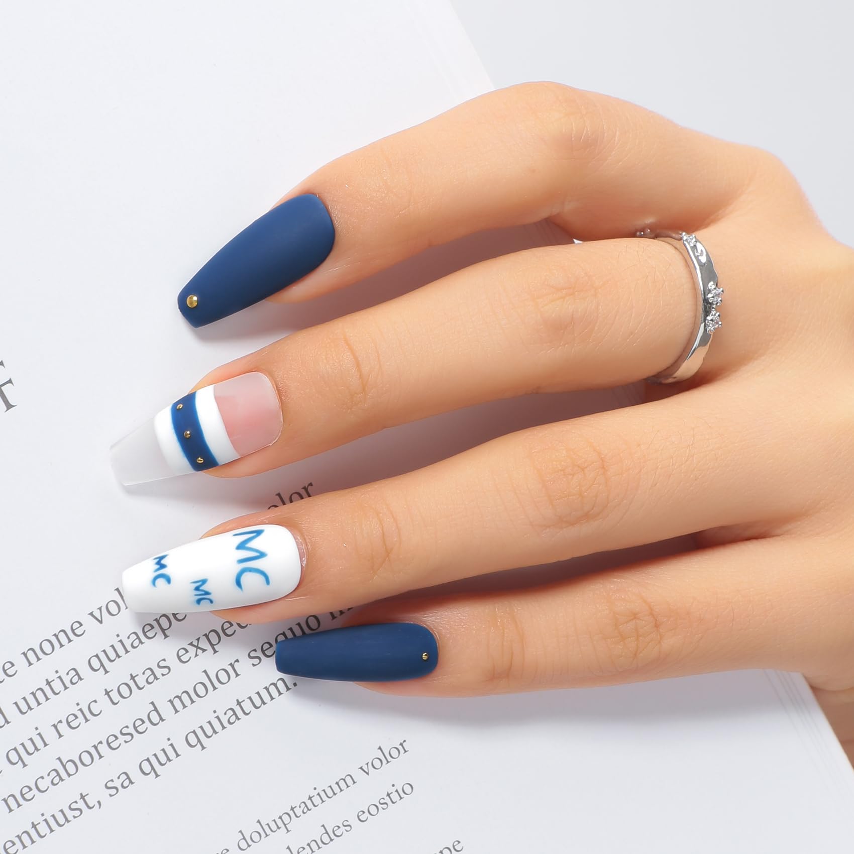 Nails showing even coverage with navy MAYCHAO gel polish.