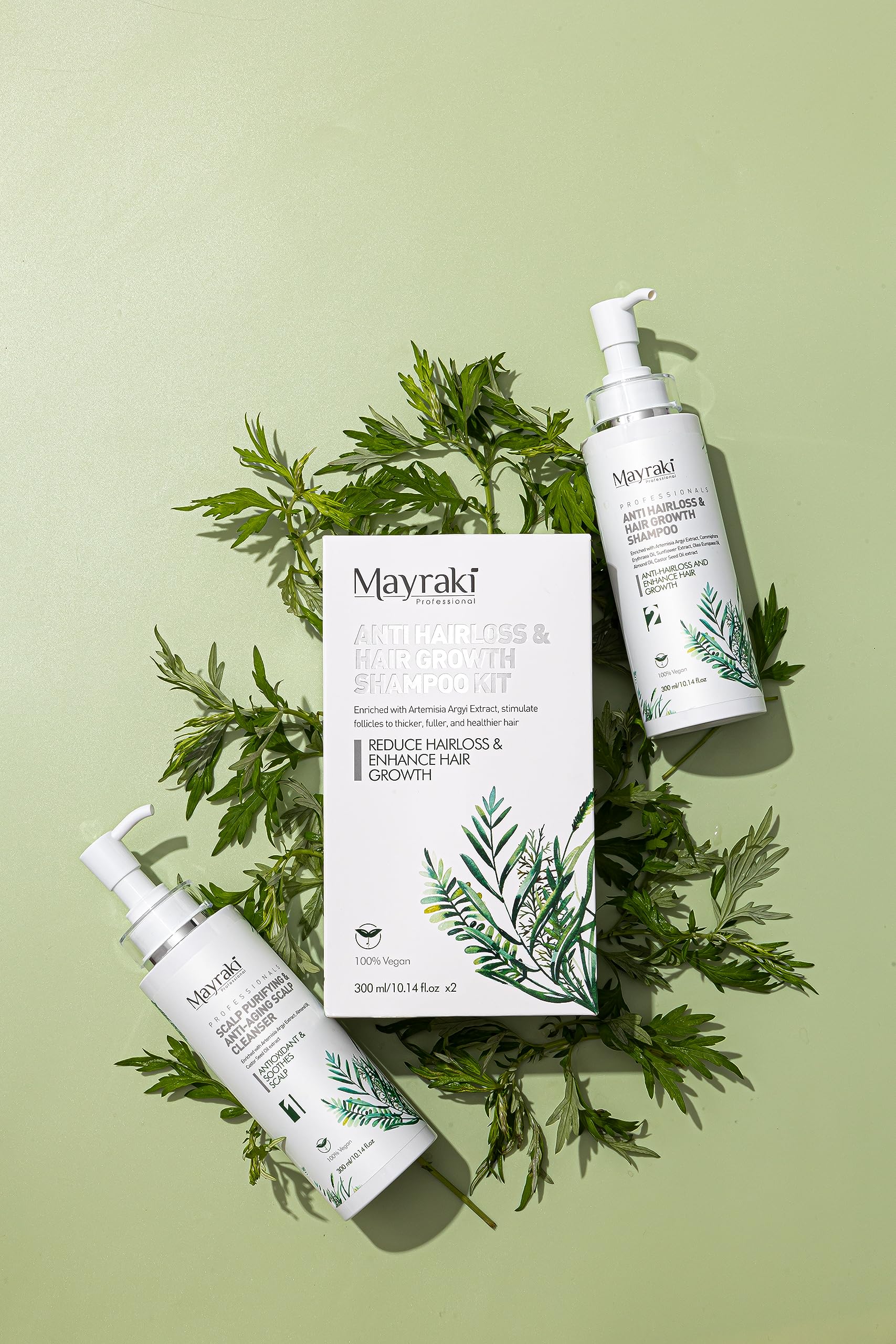Mayraki Professional bottle close-up, vegan formula nourishes hair with castor and almond oils.