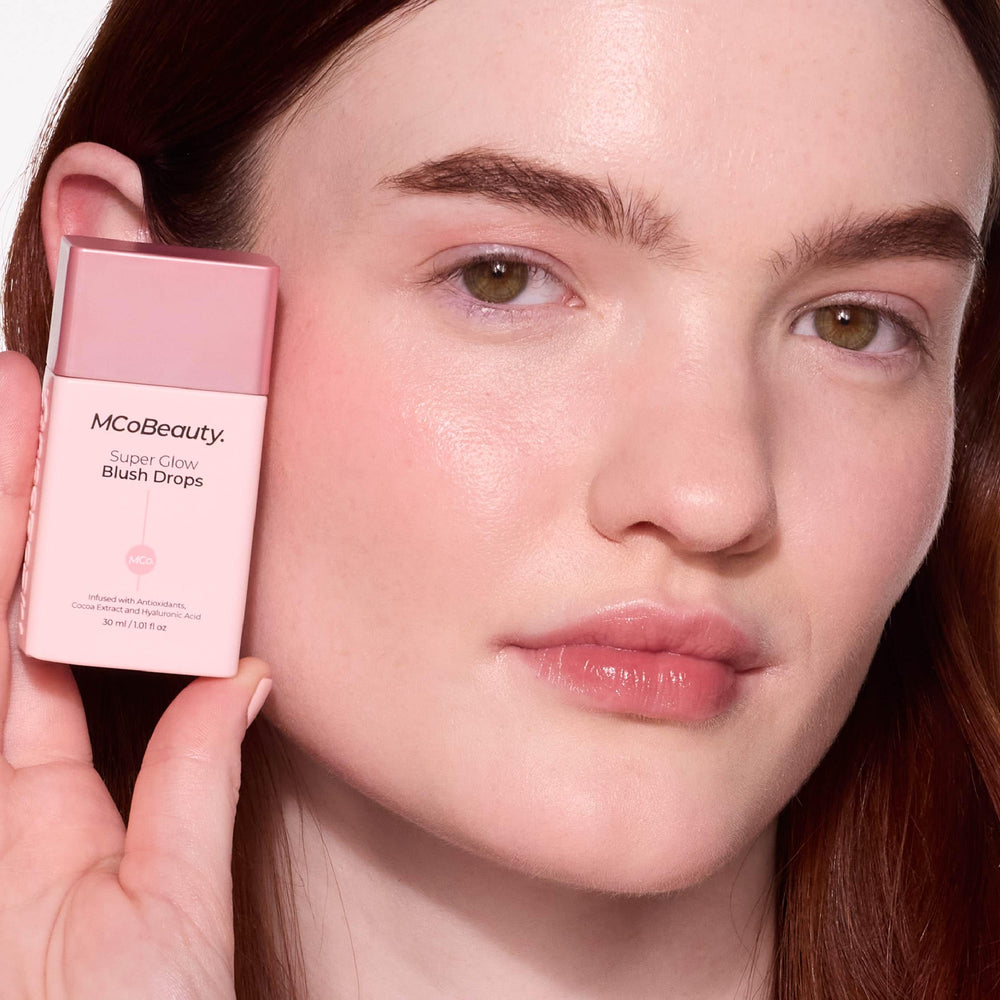 Blendable liquid blush glow texture ready to mix with skincare or foundation