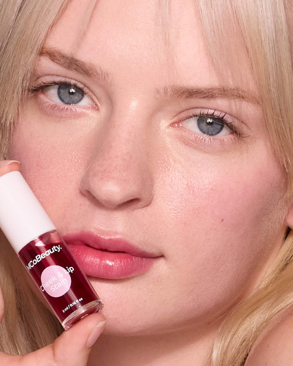 MCoBeauty doe-foot applicator provides precise lip and cheek application.