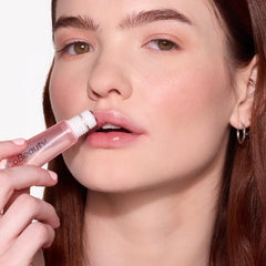Close-up of high-gloss finish from MCoBeauty lip oil on lips.