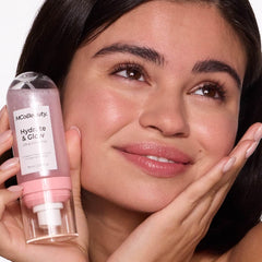 MCoBeauty Hydrate & Glow body mist for on-the-go hydration and shimmer.