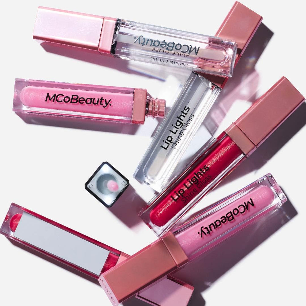 MCoBeauty Lip Lights Shine Gloss application close-up shows silky, non-sticky glow.