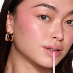 MCoBeauty Lip Lights Shine Gloss with LED mirror for quick touch-ups.