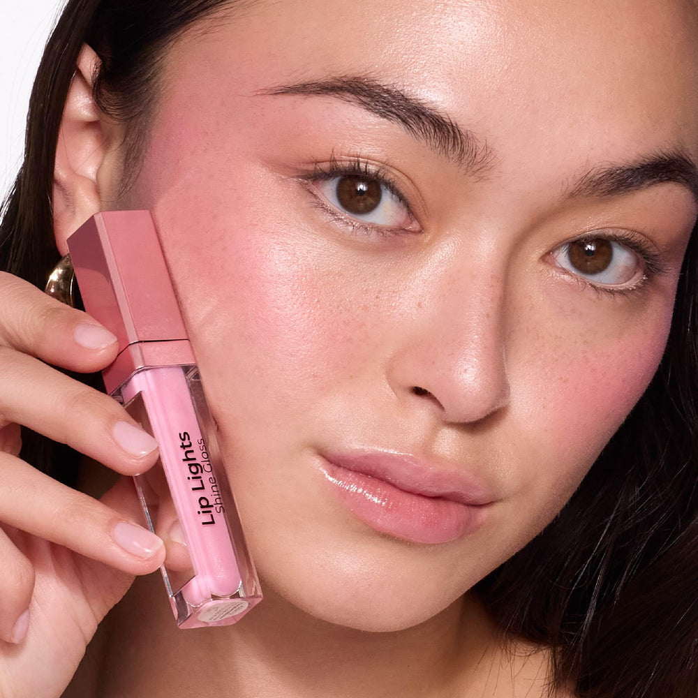 MCoBeauty Lip Lights Shine Gloss packaging highlights chic, portable design.