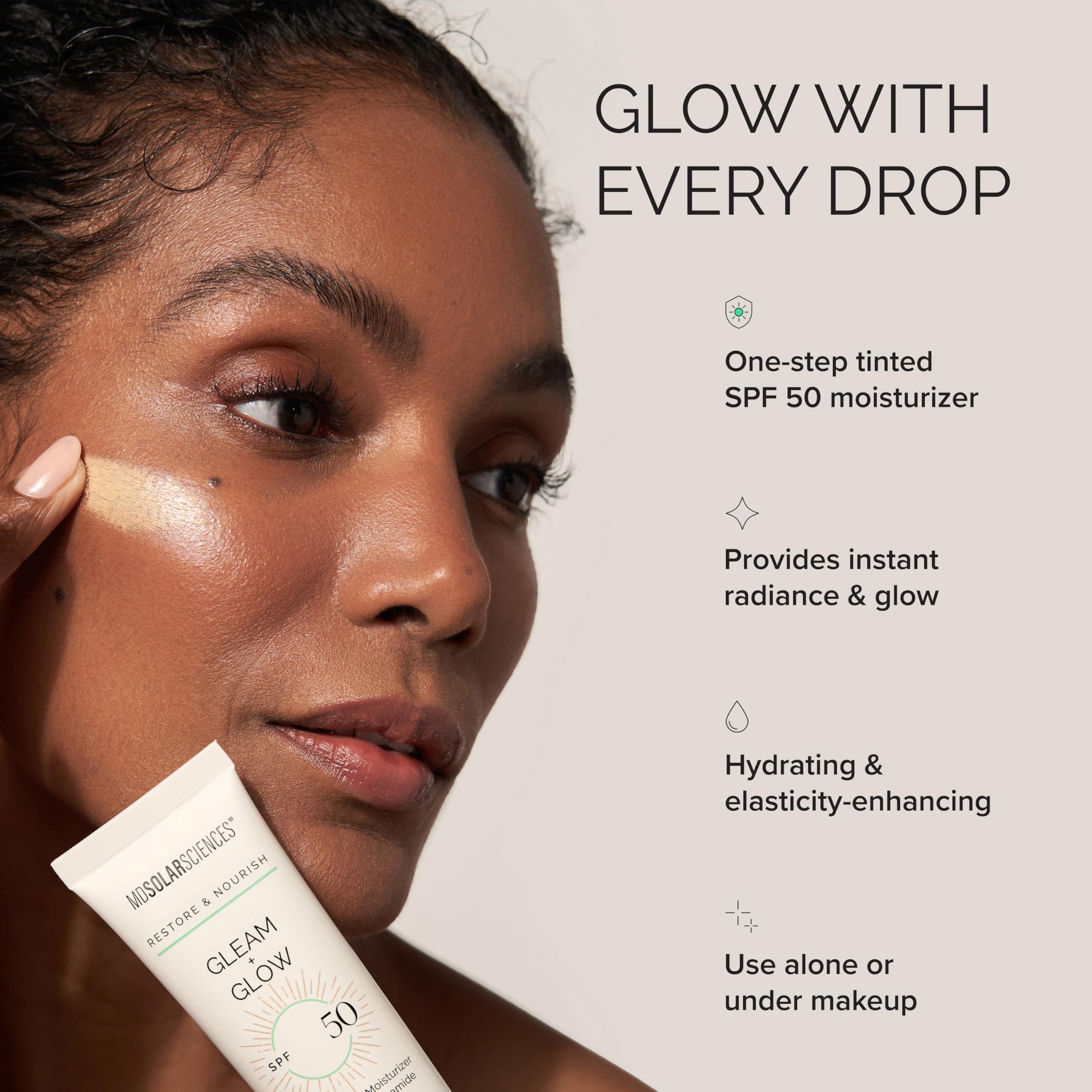 Applying Gleam + Glow SPF 50 as a tinted moisturizer