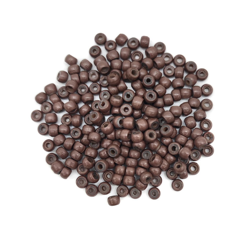 Medsuo nano ring beads in black close-up demonstrating secure grip for extensions
