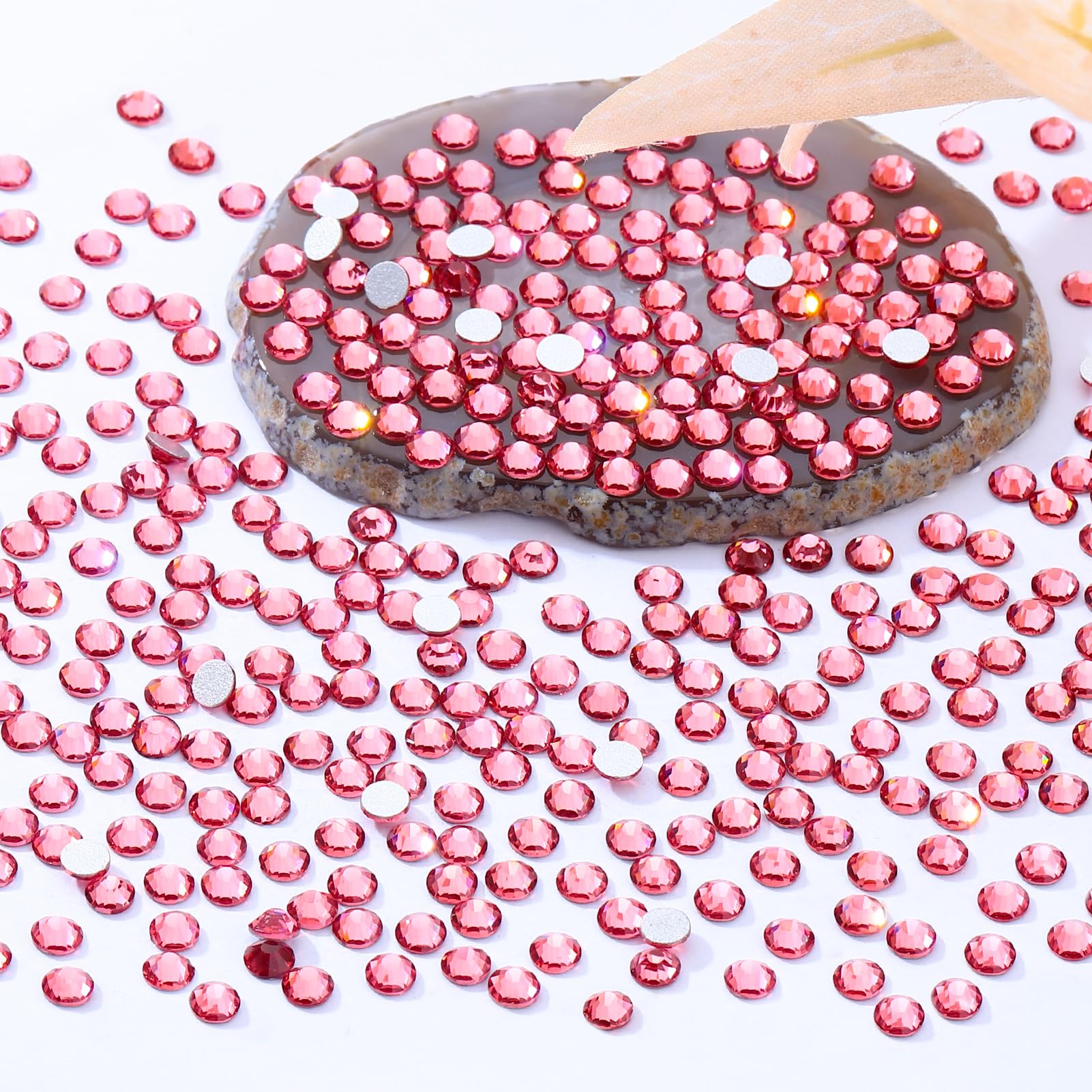 Meibite rose flatback rhinestones feature multi-faceted cuts that reflect light vividly.