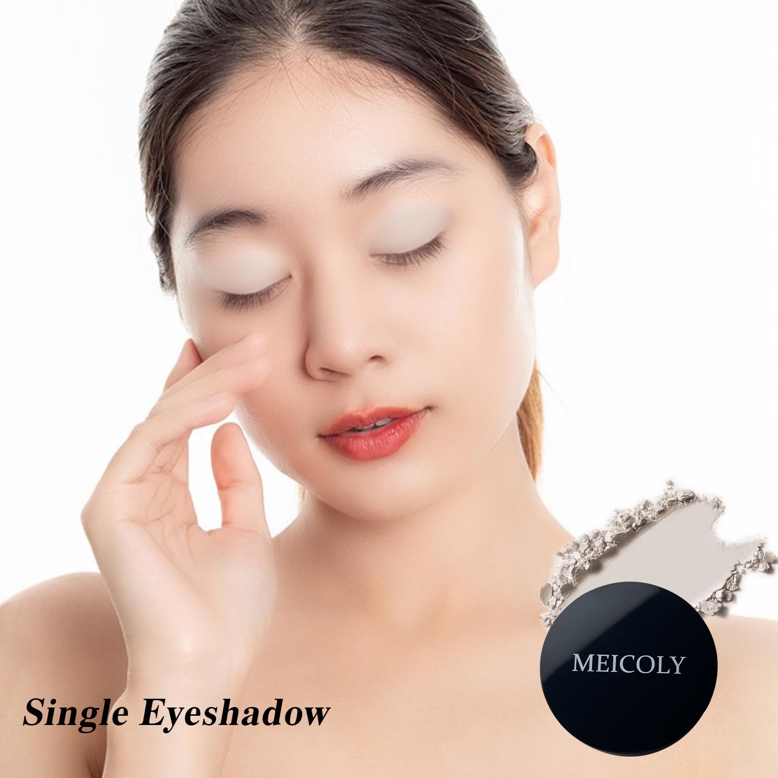 Applying MEICOLY Macaron Grey Eyeshadow on the eyelid for precise color.