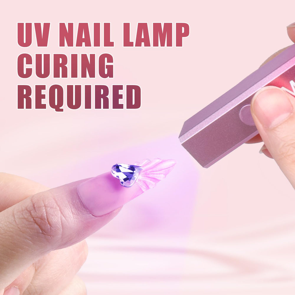 UV lamp curing MEKK rhinestone glue with gems secured on nails