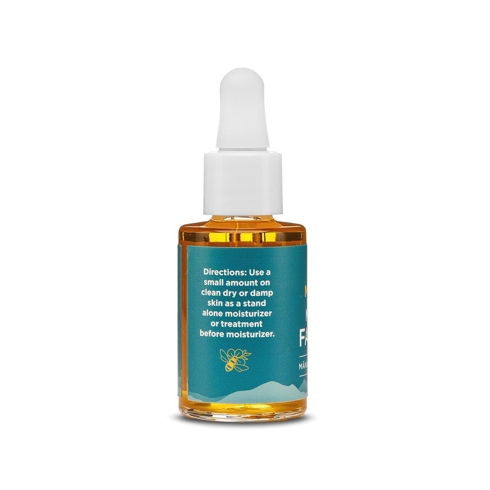 MELORA Manuka Face Oil dropper closeup highlighting precise application.