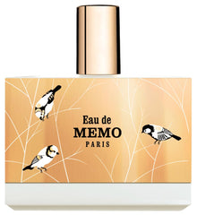 Memo Paris Eau de Memo bottle close-up, highlighting fresh bergamot and green tea notes.