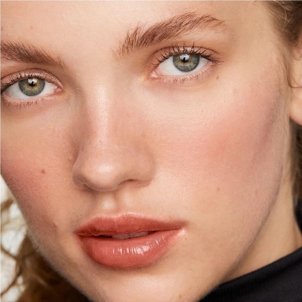 Tubing wand close-up captures smooth, even application.