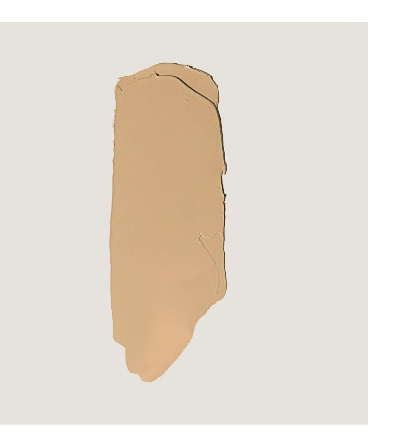 MERIT Minimalist Foundation Stick Camel packaging durable design for on-the-go use.