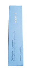 Merit Minimalist Foundation Stick in Umber, packaging close-up with vegan cruelty-free badge.