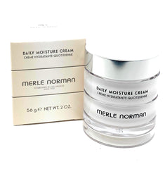 Merle Norman Daily Moisture Cream texture swatch indicating non-greasy finish for comfortable wear.