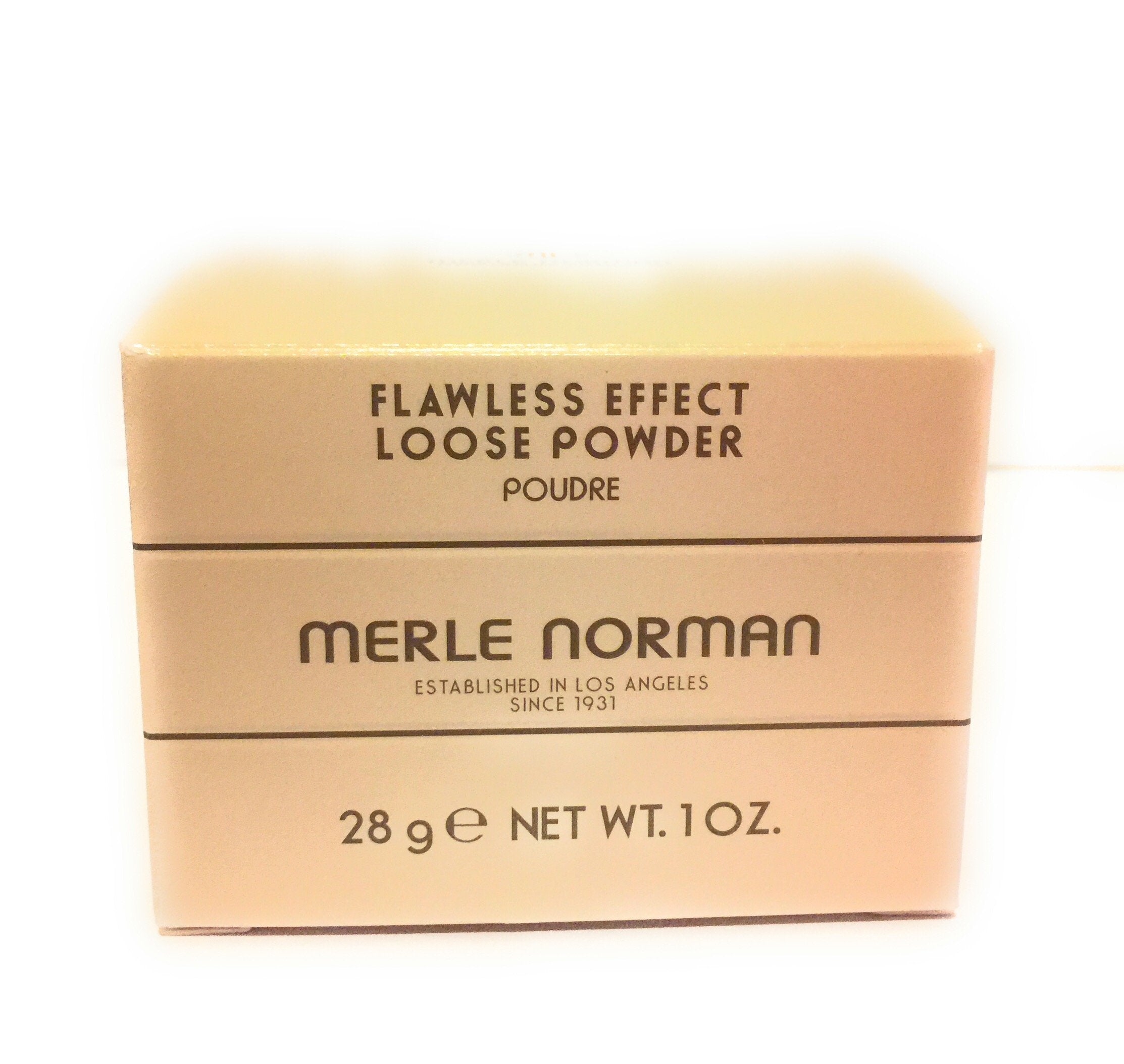 Merle Norman Flawless Effect Loose Powder Nearly Nude brush-application aids seamless blending.