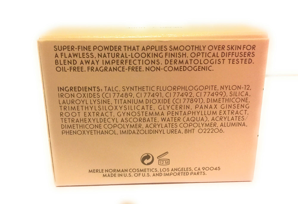 Merle Norman Flawless Effect Loose Powder Nearly Nude glow-finish for subtle radiance.