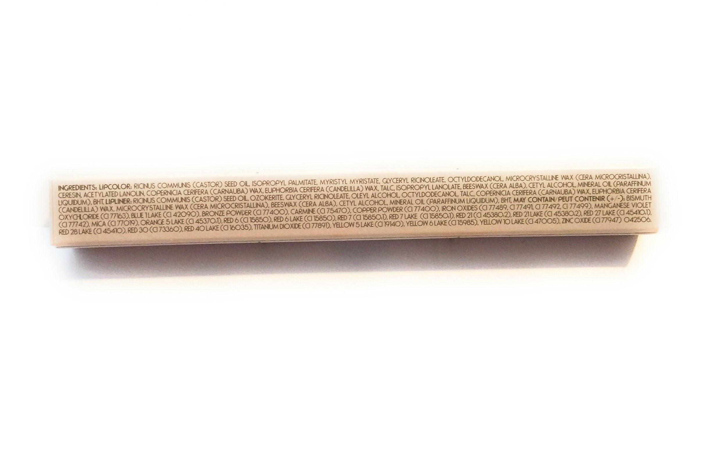 Merle Norman Lip Pencil Plus Cocoa Buff swatch highlights smooth semi-matte finish.