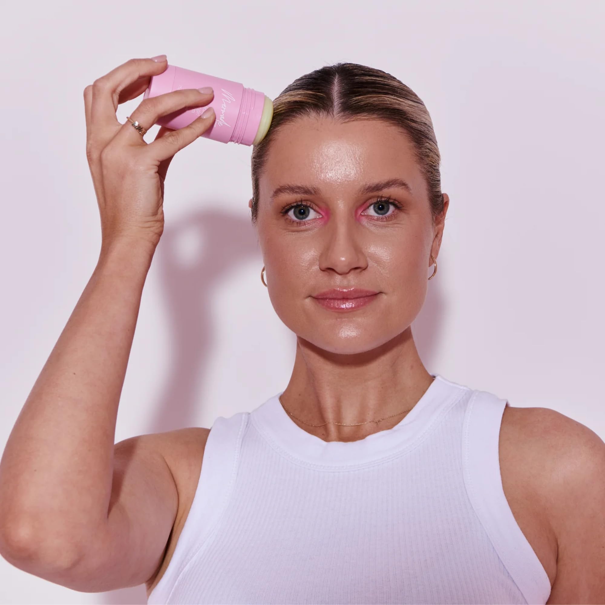 Mermade Hair Wax Stick pink on-the-go touchups keep style crisp throughout the day.