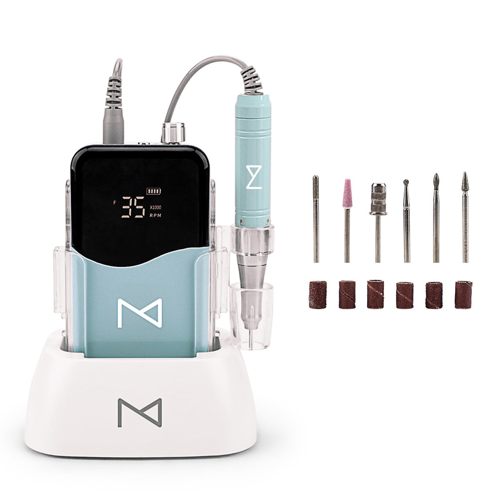 Mermaid coreless 35k rpm handpiece in use during nail shaping.