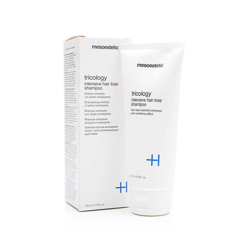 Mesoestetic Tricology shampoo label close-up, signals professional-grade thinning-hair formula.