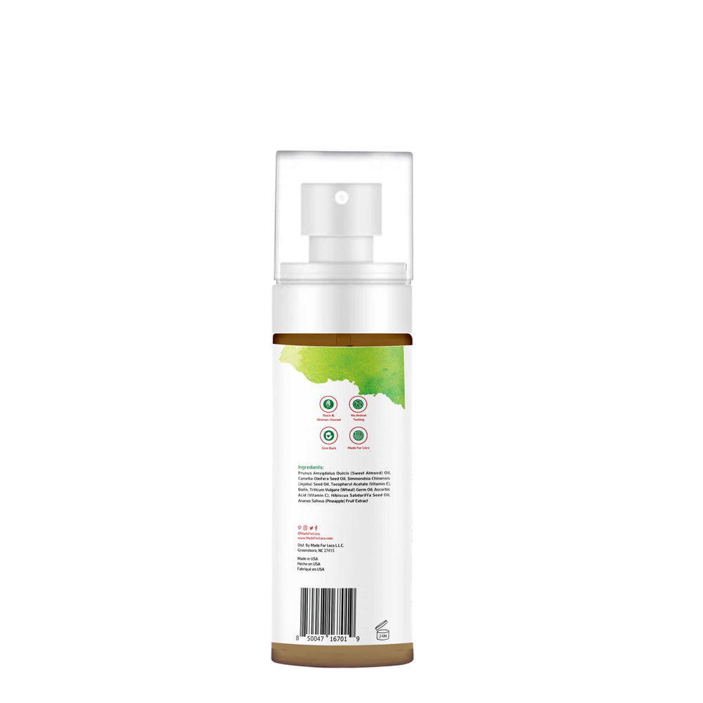 Bottle held in hand showing compact, travel-friendly size.