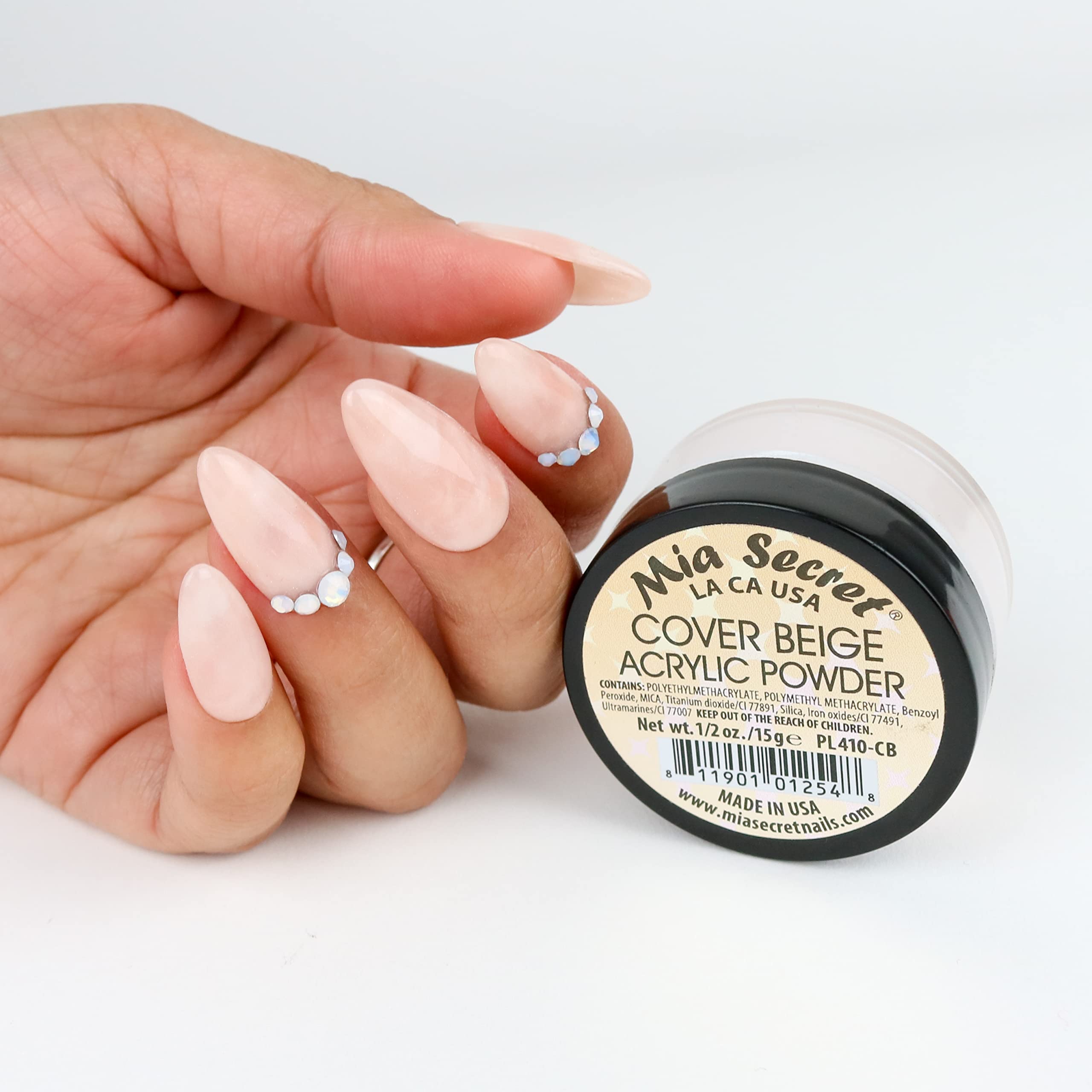 Mia Secret cover beige acrylic powder texture closeup for smooth consistency.