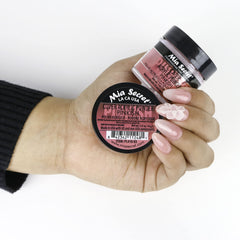Pouring Mia Secret Cover Pinkish powder to show texture and consistency