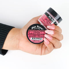 Close-up of Mia Secret Cover Pinkish powder texture showing self-leveling consistency.
