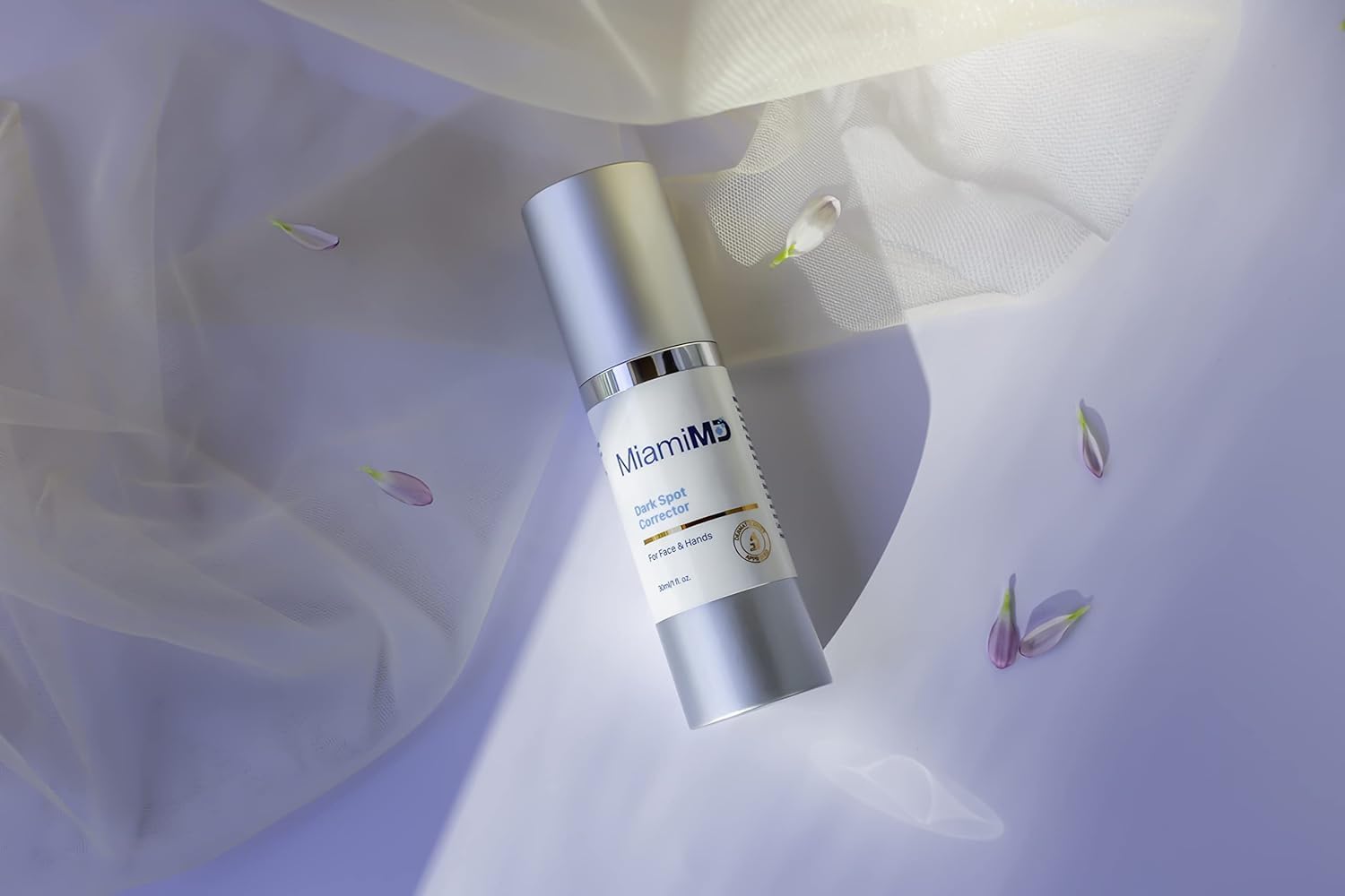 Face-area application with MiamiMD serum for targeted discoloration care.