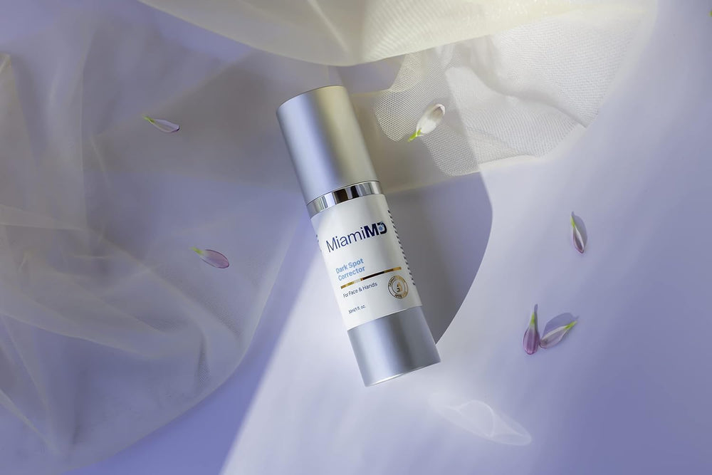 Face-area application with MiamiMD serum for targeted discoloration care.