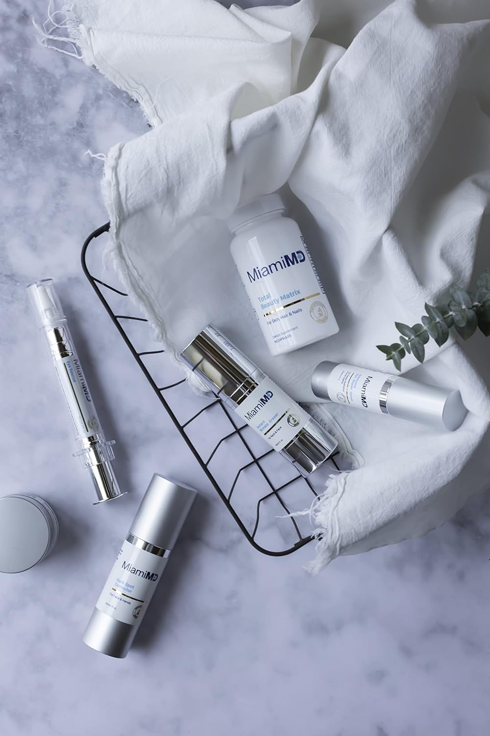 Label details on MiamiMD serum emphasize cruelty-free and BHA-free properties.