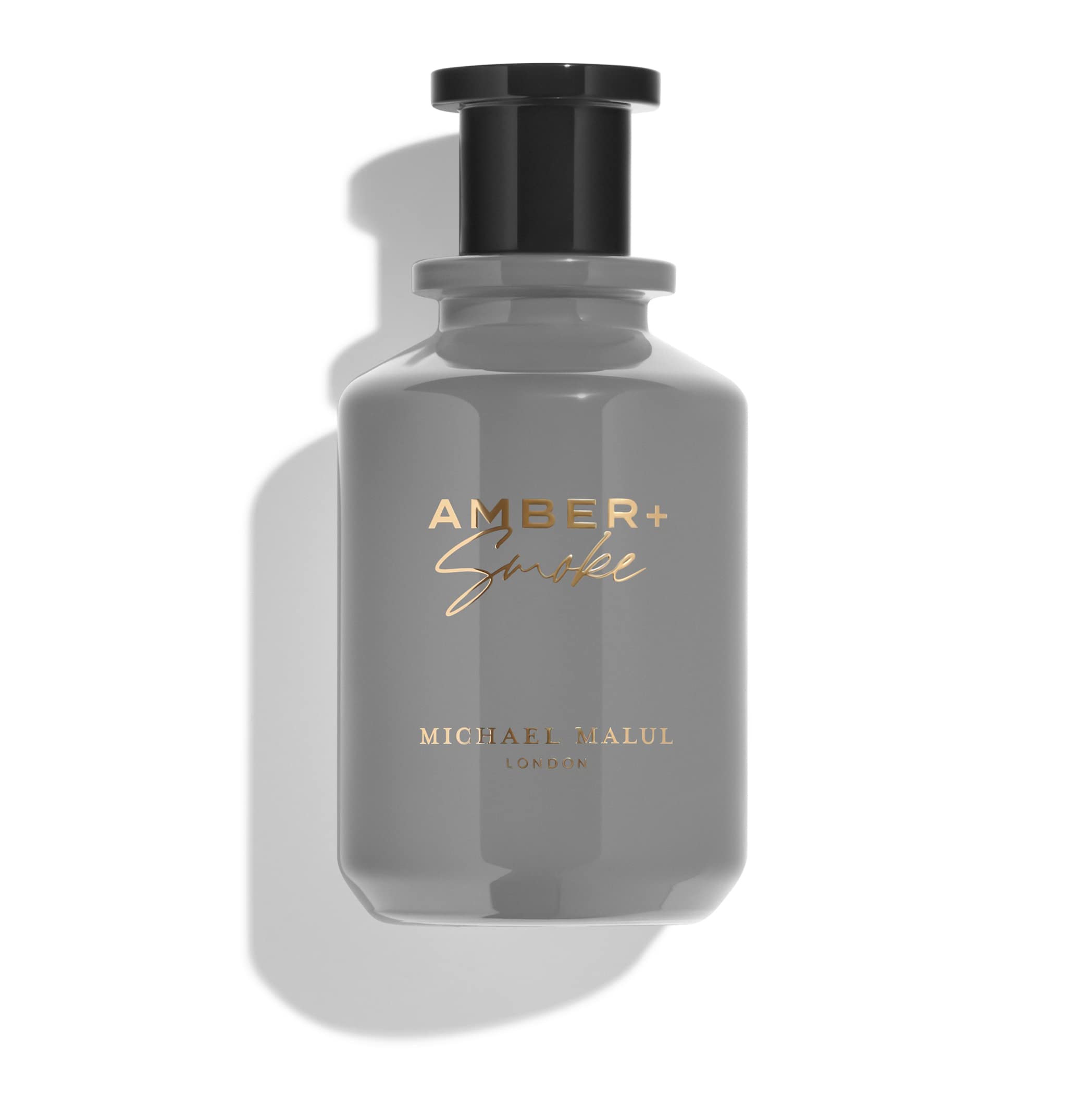 Michael Malul Amber + Smoke bottle front, bold design for everyday confidence.